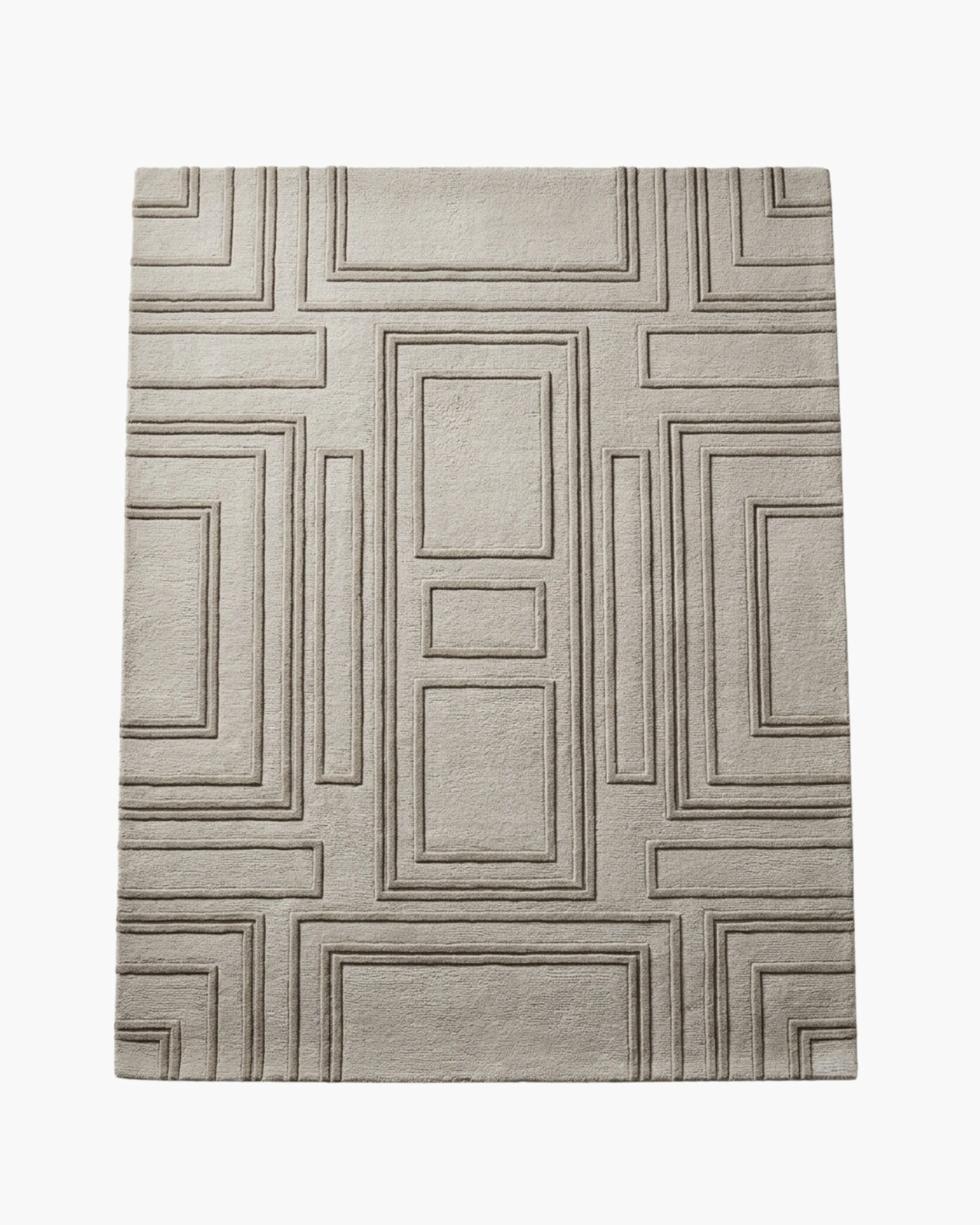 Coffered Stone beige textured geometric rug with carved nested-rectangle panels in high-low relief