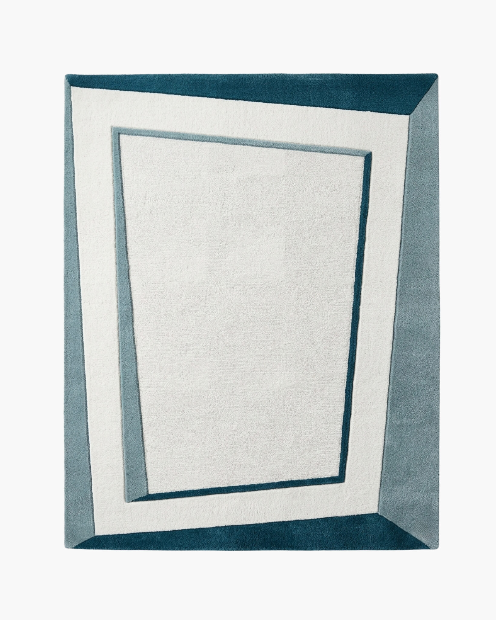 Tidal Frame teal and ivory bordered wool rug with concentric carved bands framing a calm ivory center