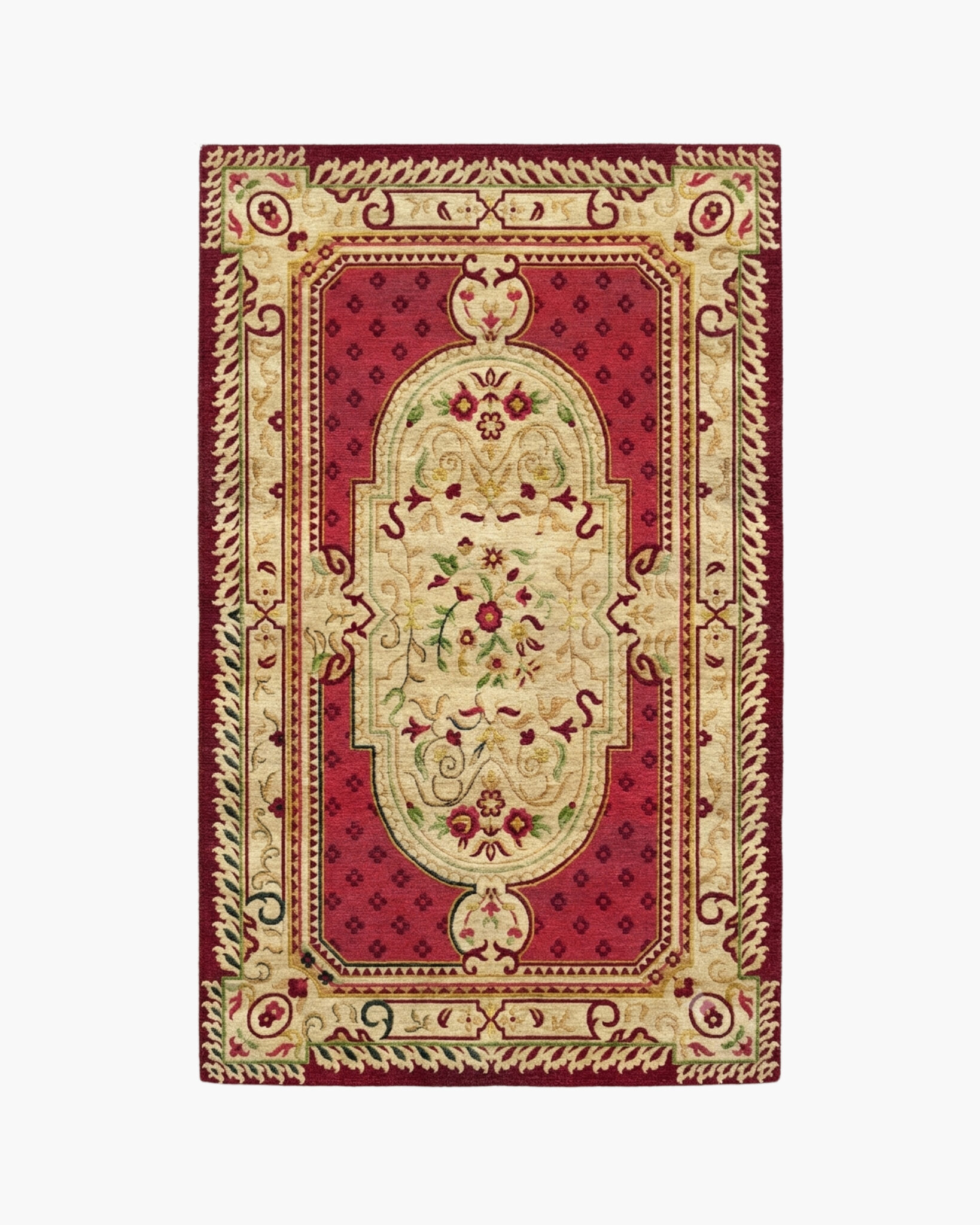 Crimson Court red Savonnerie medallion rug with a cream floral medallion on a deep crimson field