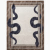 Bronze Vipers navy snake rug with two mirrored serpents on an ivory center and a lustrous bronze border