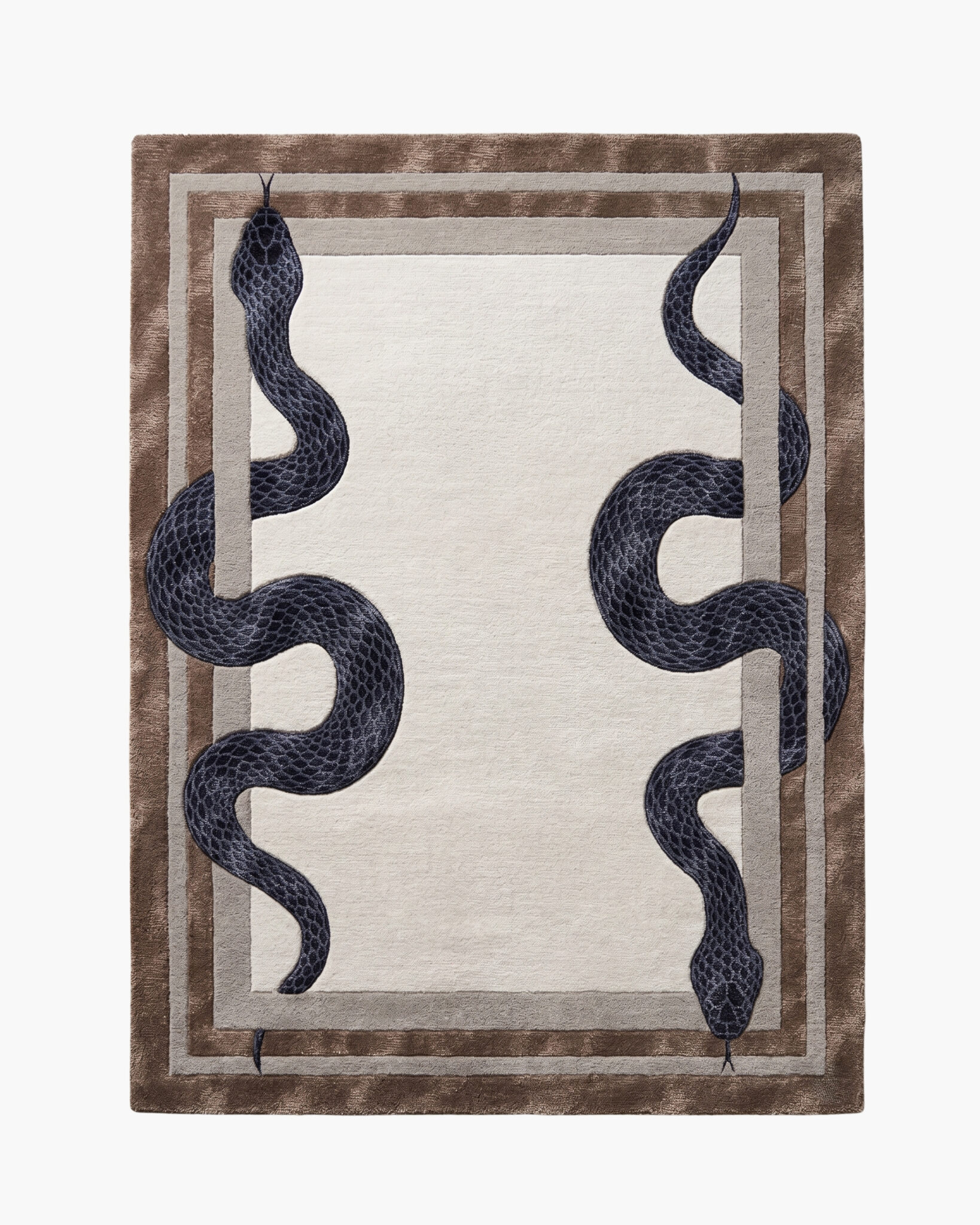 Bronze Vipers navy snake rug with two mirrored serpents on an ivory center and a lustrous bronze border