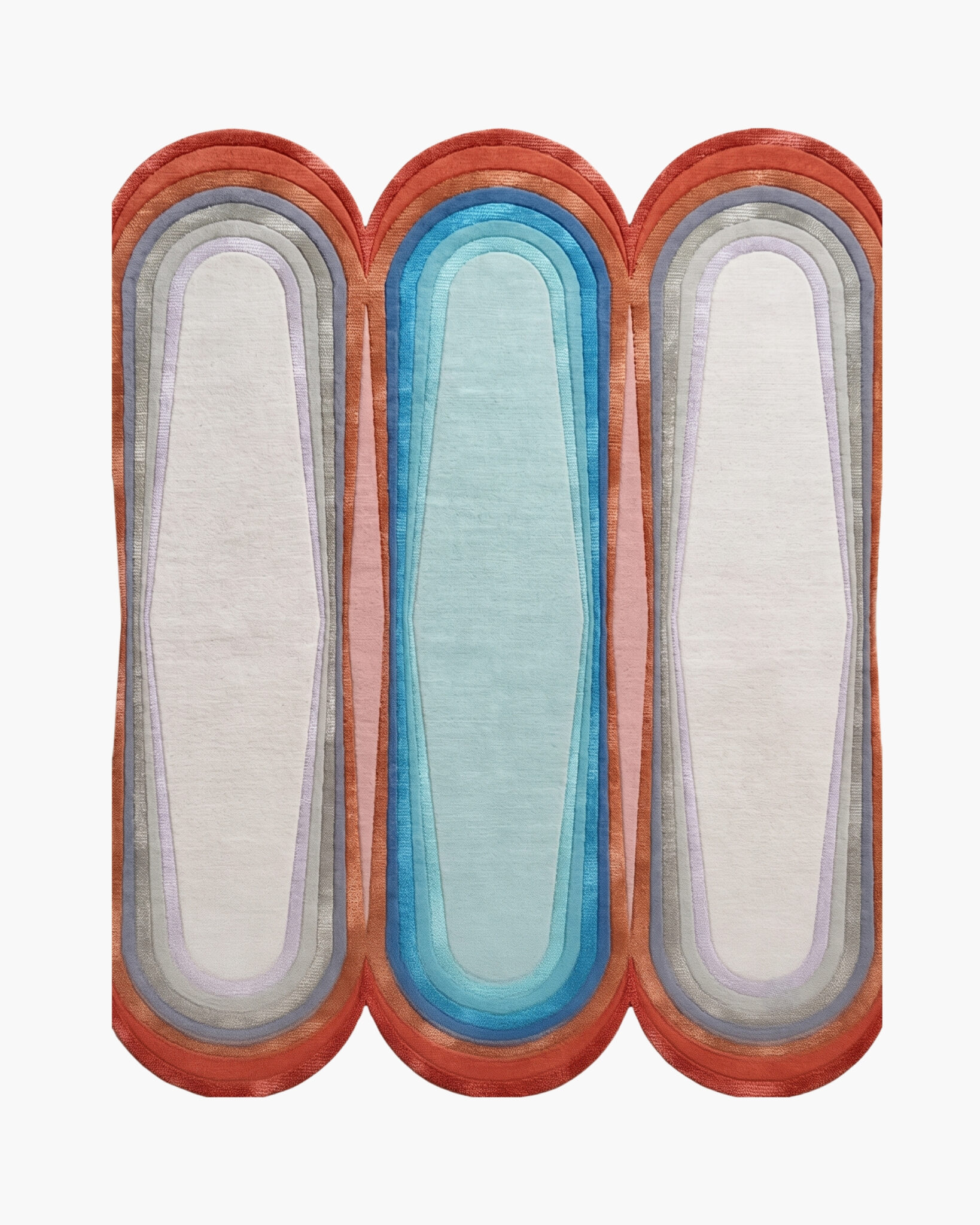 Triptych Arches arch shaped wool rug with three concentric capsule forms in coral, aqua and ivory
