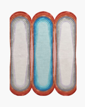 Triptych Arches arch shaped wool rug with three concentric capsule forms in coral, aqua and ivory