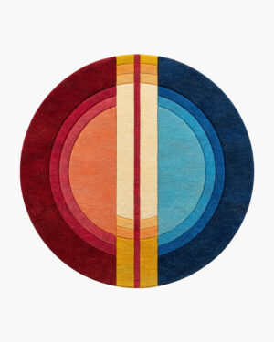 Solstice Split round red and blue wool rug with concentric rings split into a warm half and a cool half