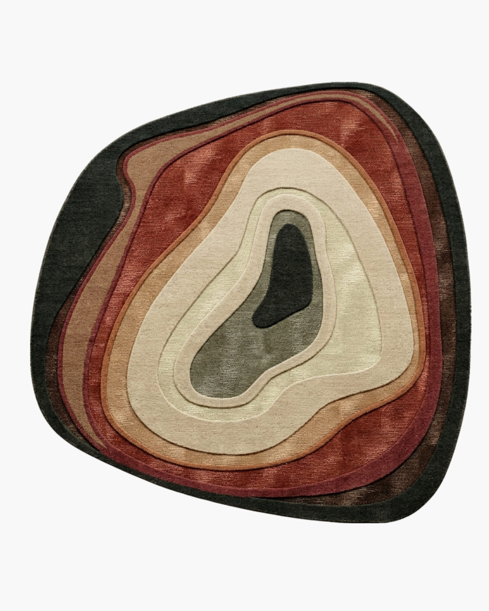 Canyon Agate organic wool rug with carved geode rings in terracotta, copper, cream and sage and a green center