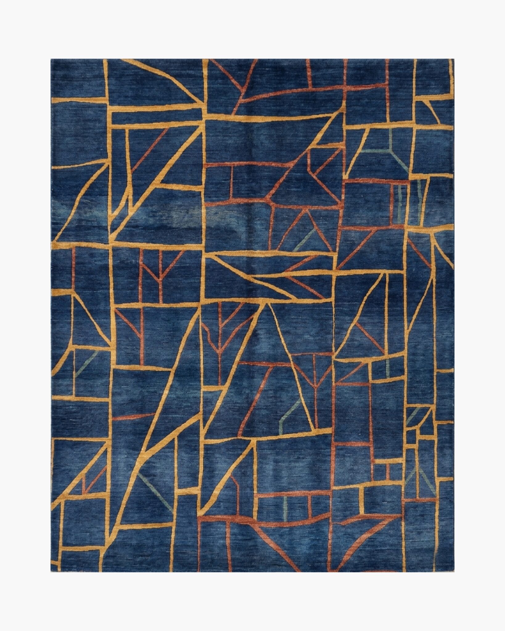 Hand knotted abstract rug in midnight blue with geometric ochre and rust line pattern