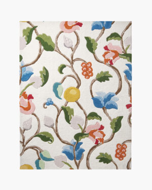 Orchard Vine chinoiserie floral wool rug with trailing vines, multicolor blossoms and fruit on an ivory ground