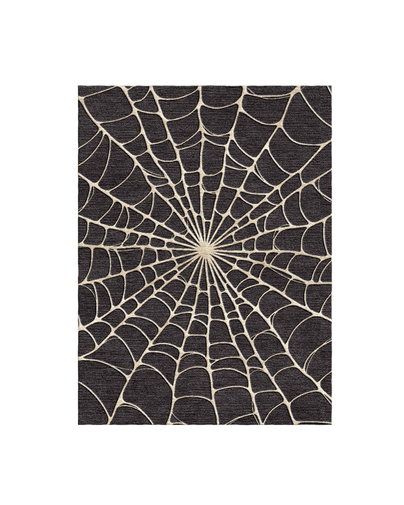 1 Charcoal-black rug featuring an intricate ivory spiderweb-inspired geometric pattern