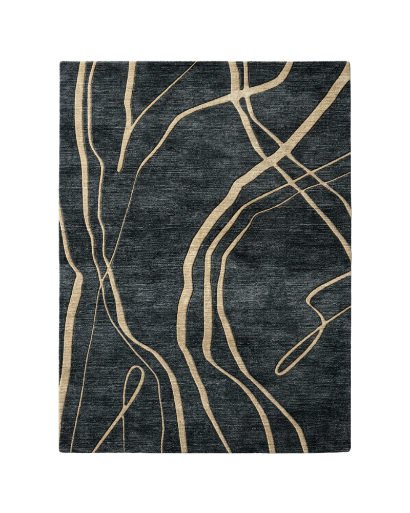 1 Charcoal abstract rug featuring flowing irregular beige lines across a dark textured background.