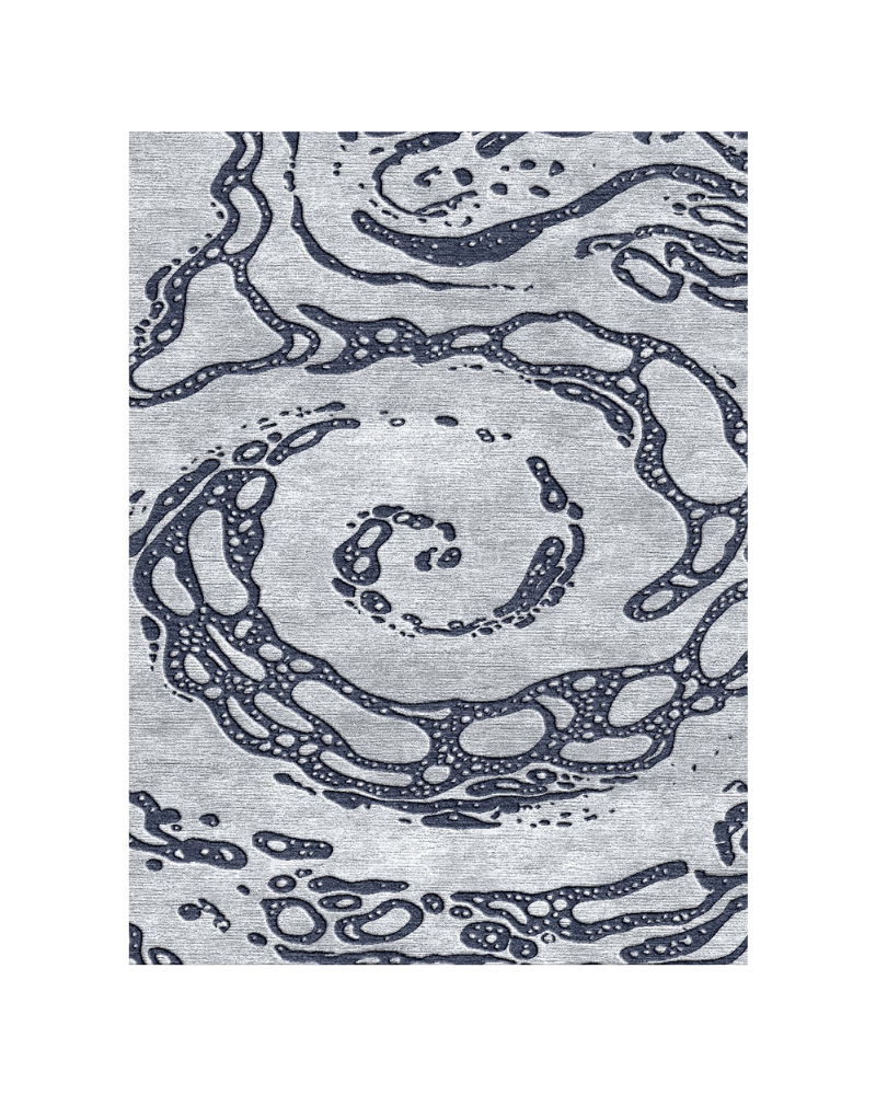 1 Indigo Tidal Flow handmade rug in silver grey with intricate dark blue organic wave patterns, crafted from 100% New Zealand wool.